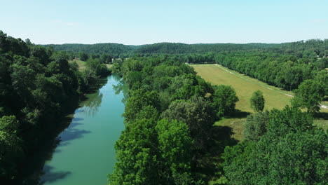 countryside nature landscape with forest and river near war eagle mill in benton county, arkansas