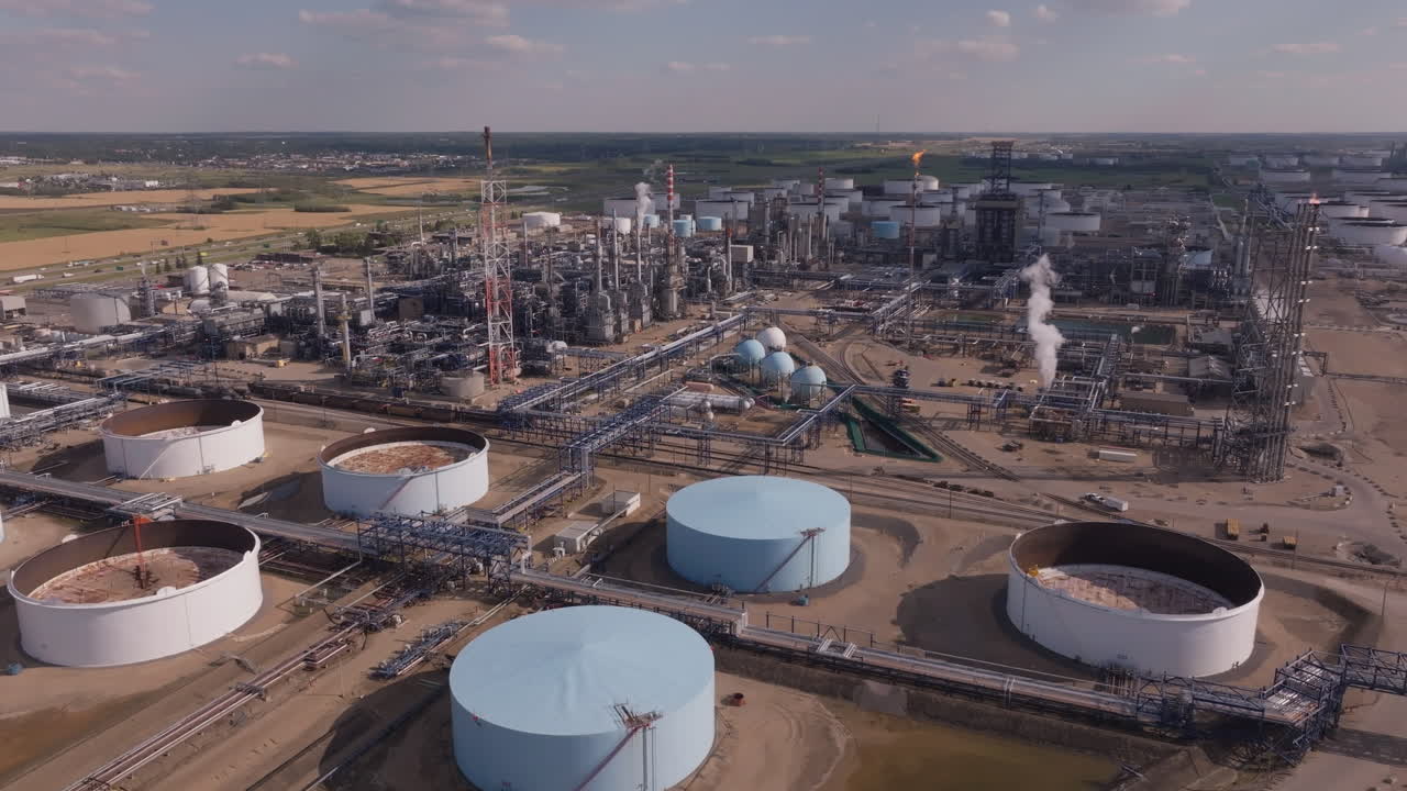 Aerial view of a vast industrial oil refinery on a sunny day
