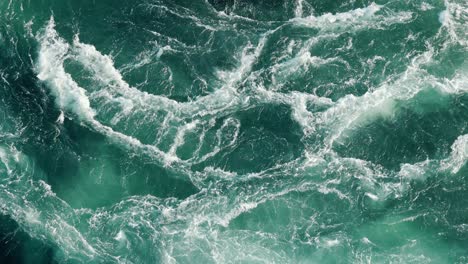 Blue-waves-of-water-of-the-river-and-the-sea-meet-each-other-during-high-tide-and-low-tide.