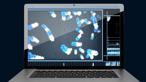 laptop screen showing falling pills video