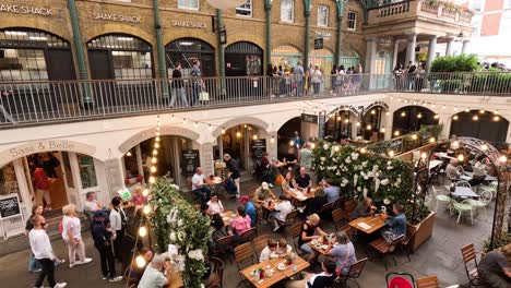 people enjoying meals at a bustling restaurant