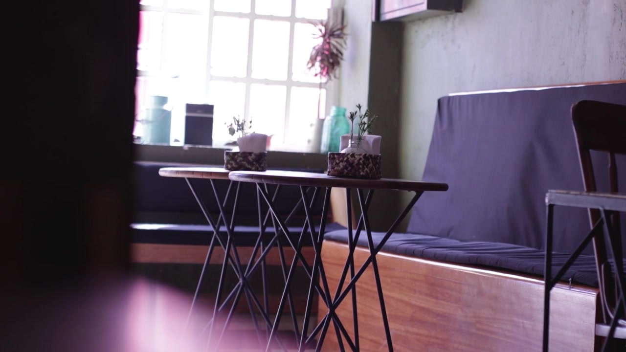 Tables and chair in an empty restaurant.