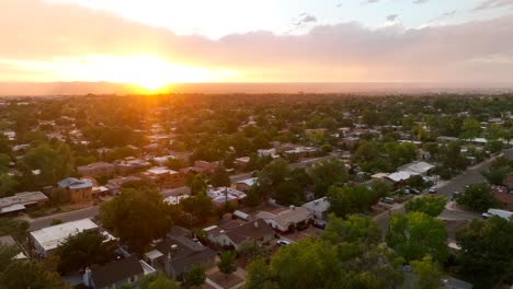 bright sunset over housing development