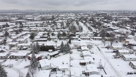 winter in canada north america snow covered suburban neighborhood houses aerial landscape