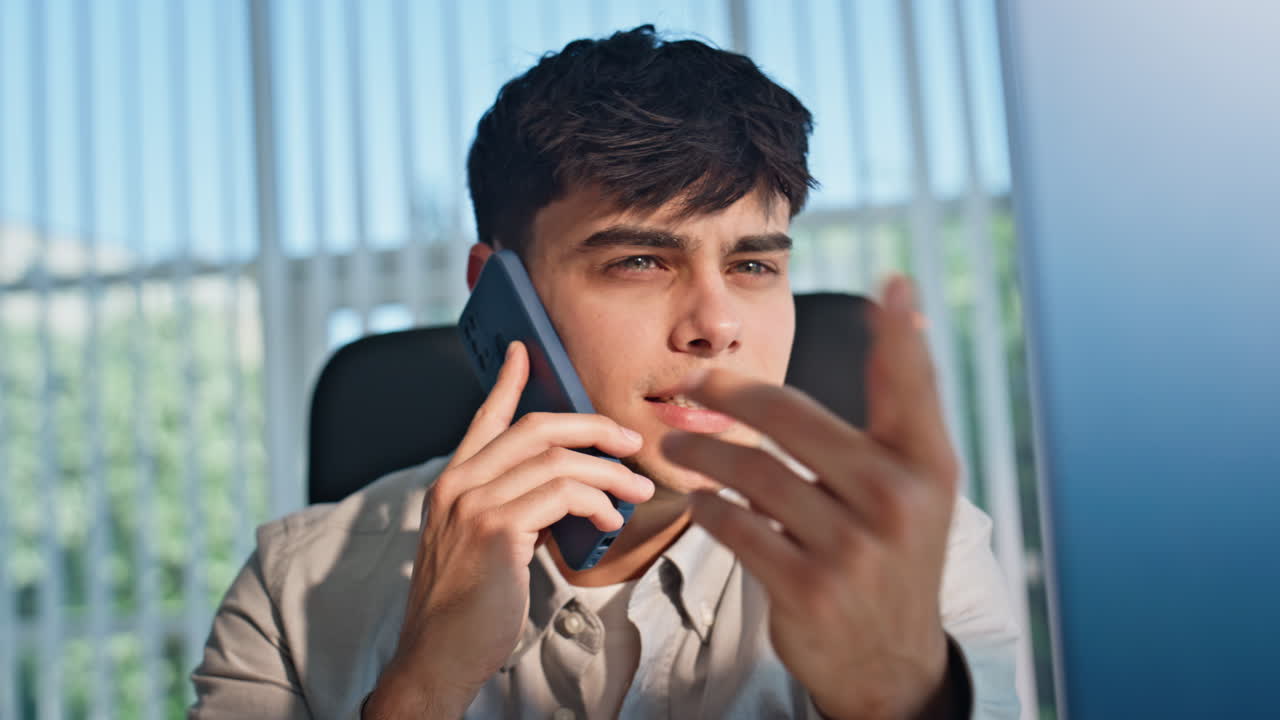 Smiling man speaking telephone feeling relaxed closeup. Businessman talking