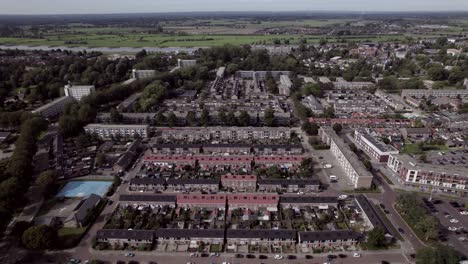 Dutch-town-neighbourhood-and-residential-area-showing-aerial-of-Waterkwartier-in-suburbs-of-Zutphen,-The-Netherlands