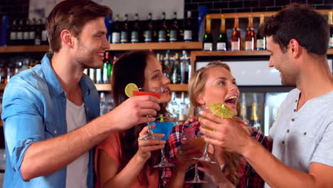 happy friends having a drink together