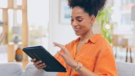 Tablet,-typing-and-woman-at-home-with-happiness