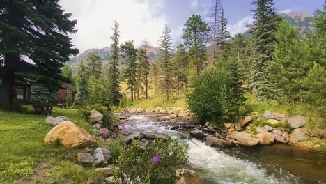 a scenic mountain river gracefully flows downstream through the picturesque valleys of colorado