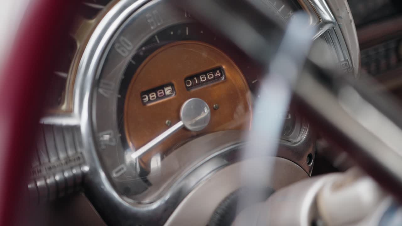 Close view of vintage car speedometer with odometer in Portugal