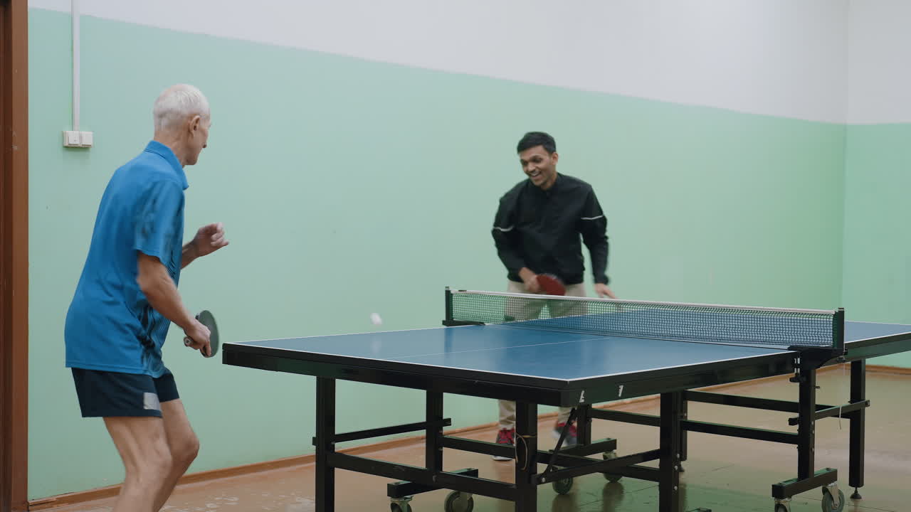 Athletes enjoy fun indoor table tennis rally, turning around table with laughter and energy, showing happiness, teamwork, and playful spirit while hitting ball across net
