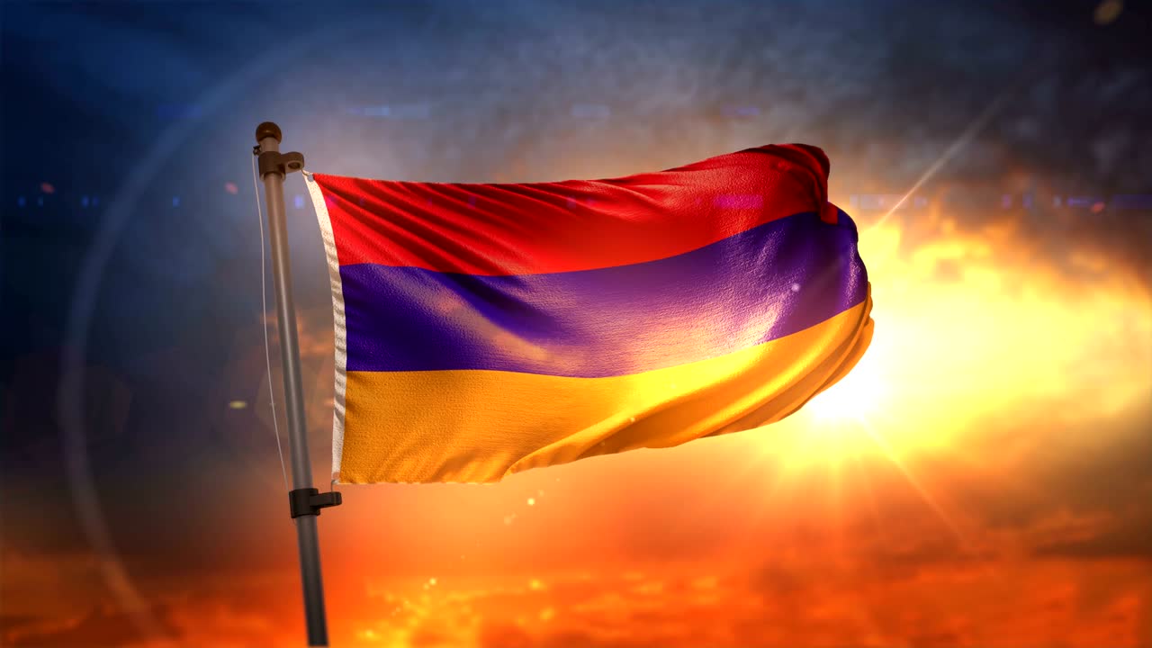 アーメニアの国旗を背面に照らす美しい日の出のループ スローモーション 4k