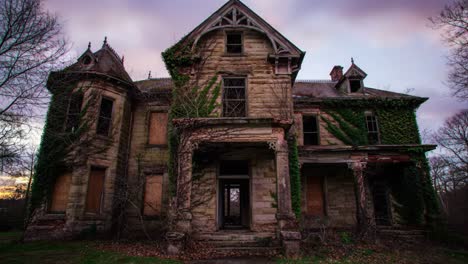 a group ventures into an abandoned mansion, covered in ivy, witnessing its decaying beauty as the sun sets. the eerie atmosphere captivates as history echoes through the empty halls.