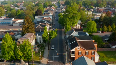 Aerial-establishing-shot-of-small-town-America-in-summer