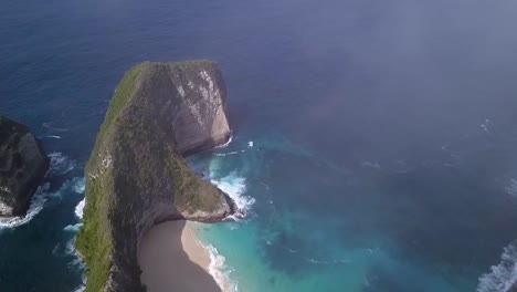 Dramatic-aerial-view-flight-slowly-tilt-up-drone-flight-over-and-in-clouds
Kelingking-Beach-at-Nusa-Penida-in-Bali-Indonesia-is-like-Jurassic-Park