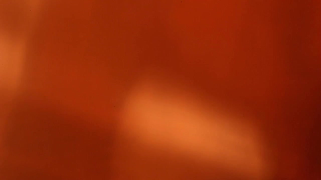 Warme oranje en rode lichtlek overgang achtergrond