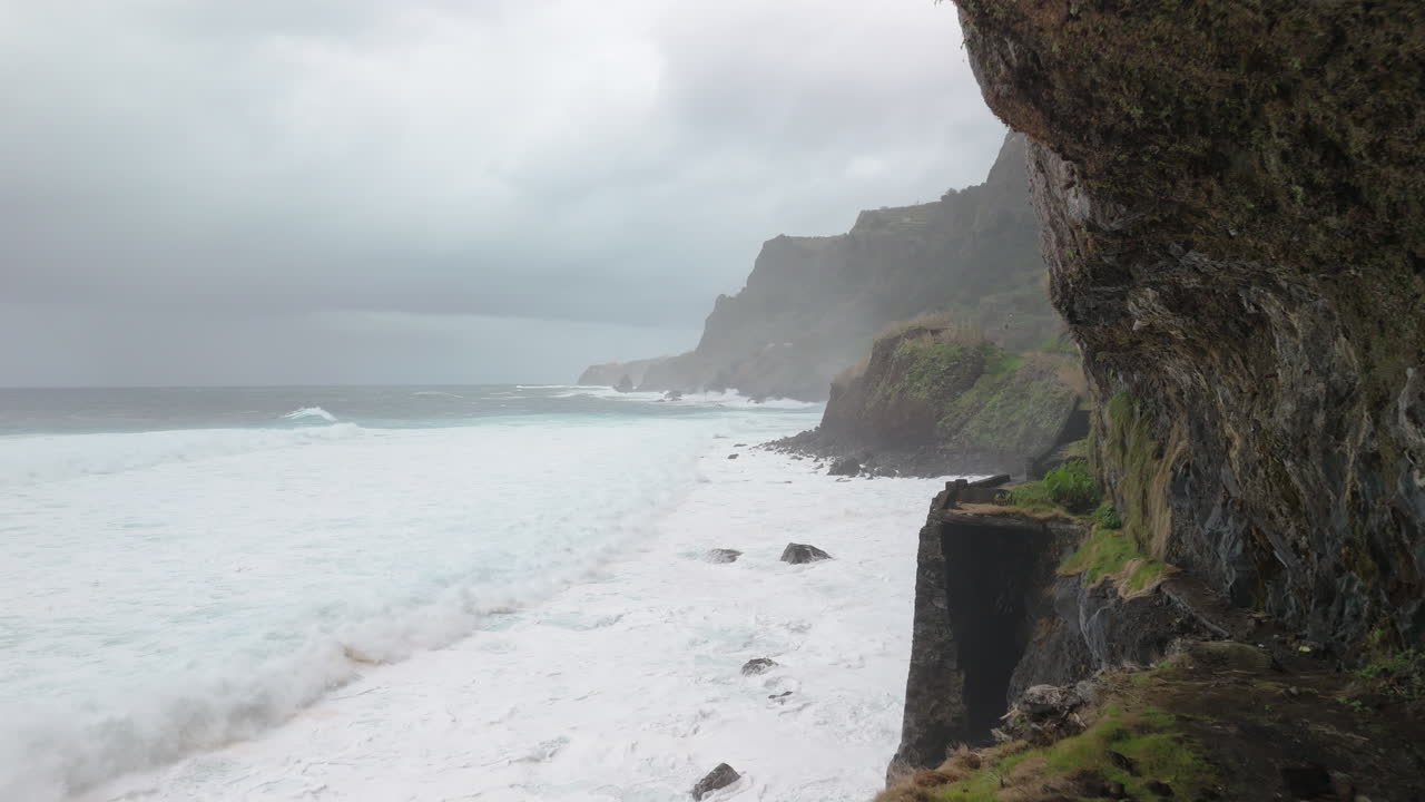 flying out sea cliff, Madeira ocean reveal, FPV drone view