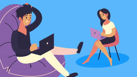 una pareja joven sentada usando computadoras portátiles