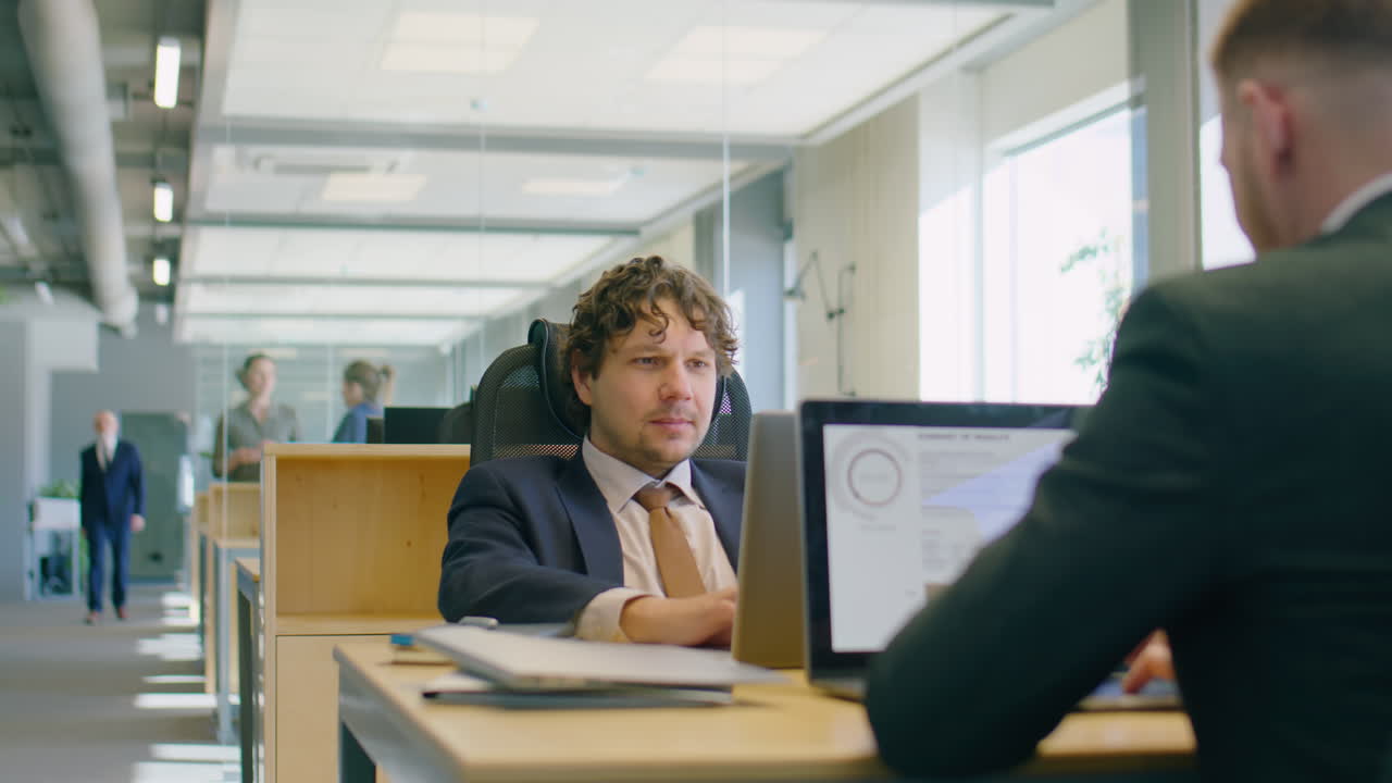 Colleagues High Fiving during Office Workday