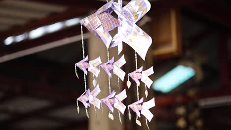 colorful hanging decoration swaying gently indoors