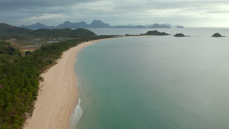 Drone-shot-showing-nacpan-beach-nearby-El-Nido,-Palawan,-Philippines