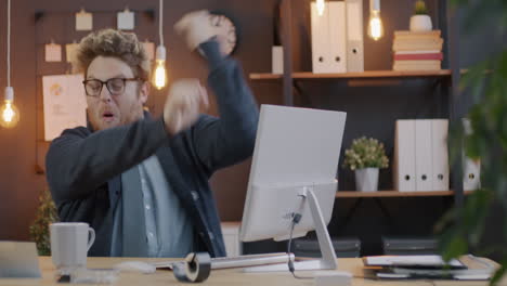 frustrated man at his desk