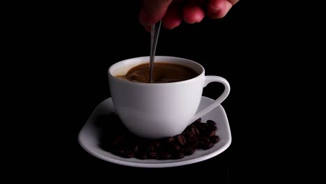 pouring coffee into a white cup