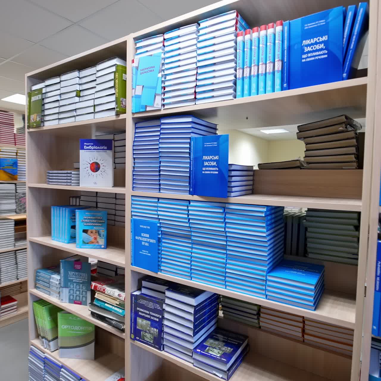 Books on shelves in ibrary