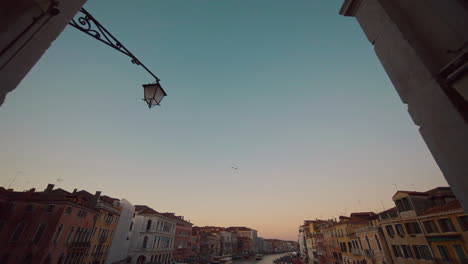 venice canal view at sunset from a bridge