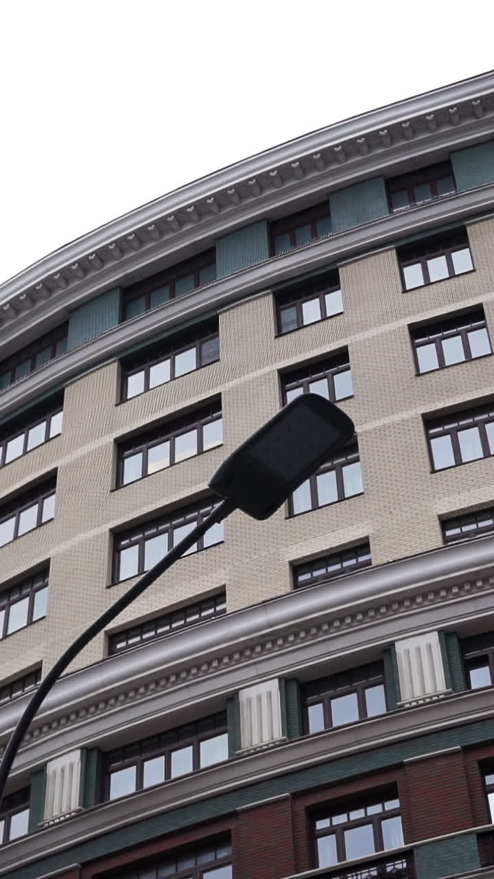 Modern Building Facade with Streetlamp