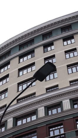modern building facade with streetlamp
