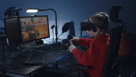 boy playing vr space simulation game in a studio