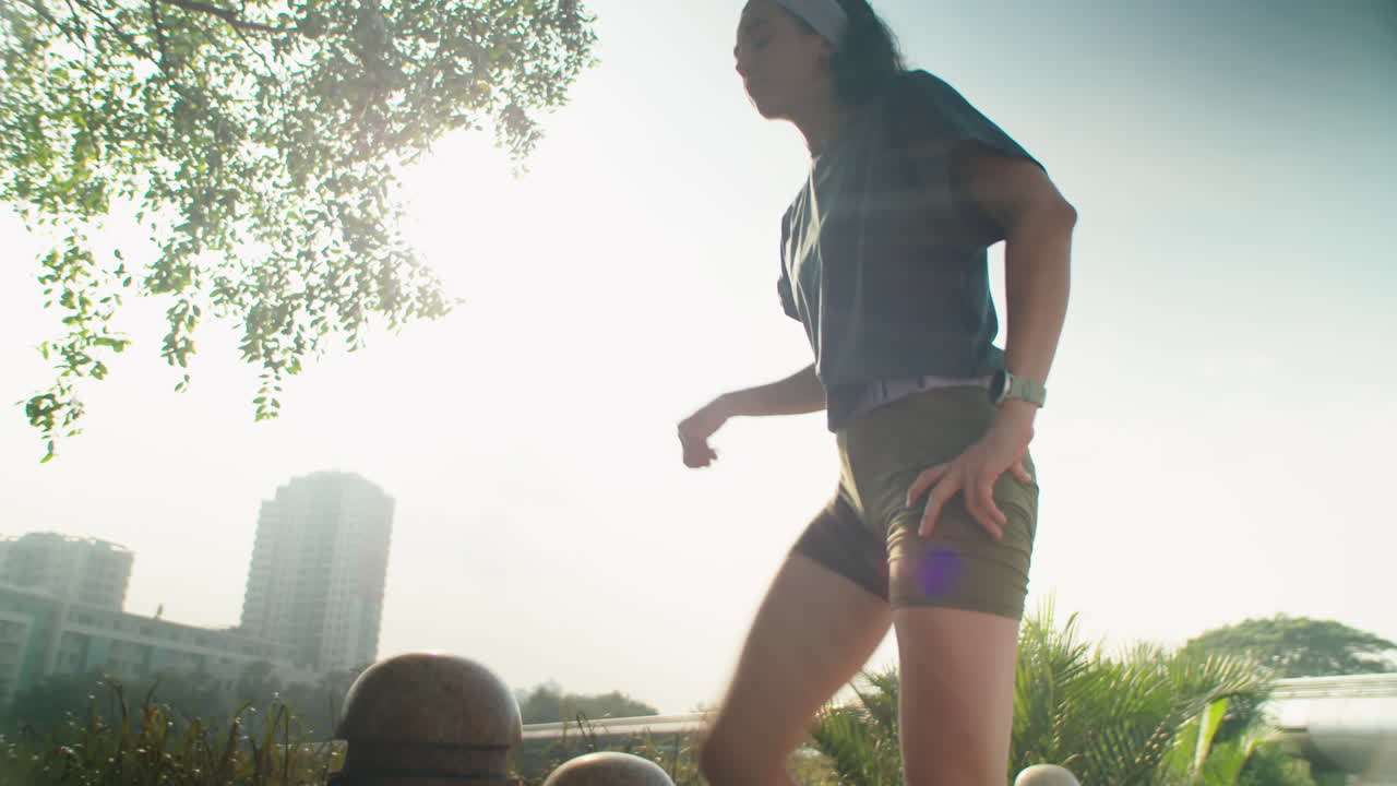 Woman Stretching before Morning Run