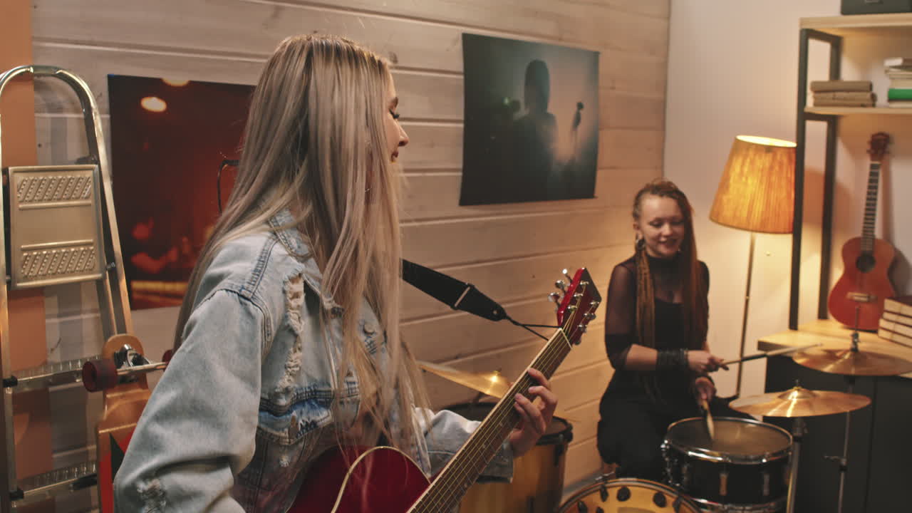 Young Women Playing Rock Music