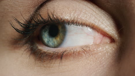 beautiful macro blue eye blinking looking pensive natural human beauty healhy eyesight close up