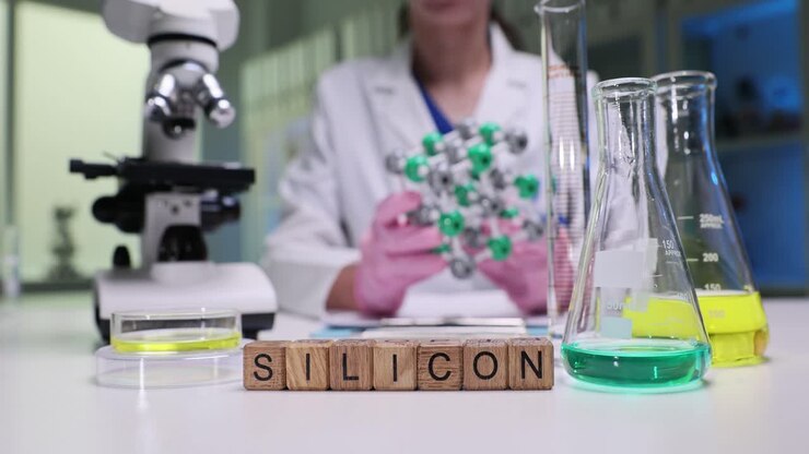 Scientist conducting research on silicon in a laboratory