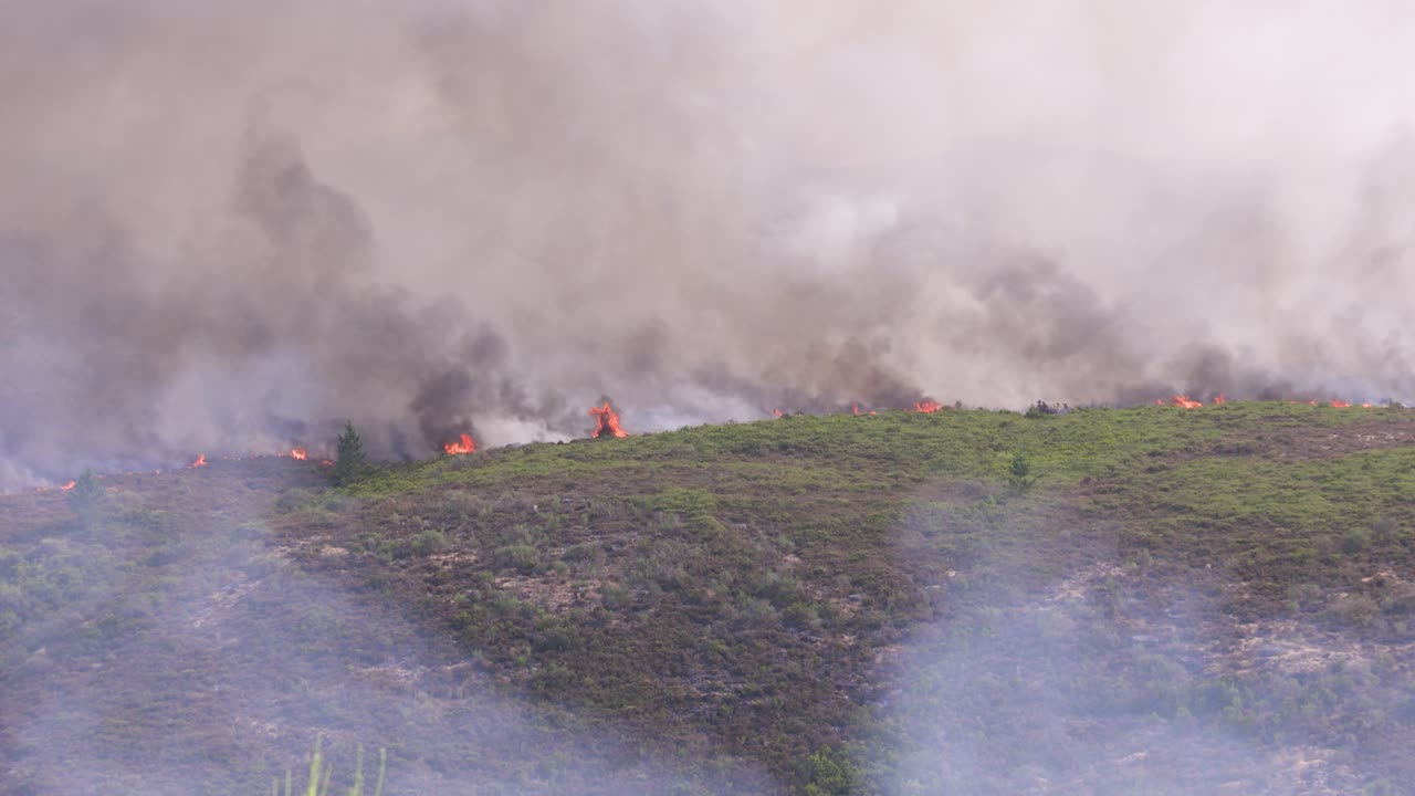Fire and smoke are all that can be seen during the raging forest fires in the Peneda Geres mountains