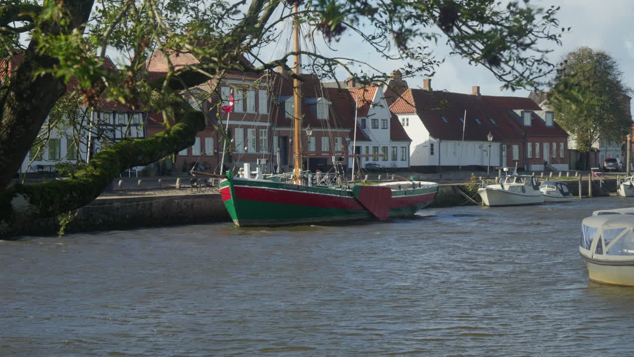Historic fishing boat moored in Ribe, Denmark's oldest town