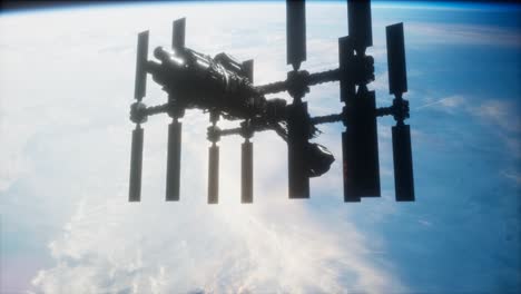 A-view-of-the-Earth-and-a-spaceship.-ISS-is-orbiting-the-Earth