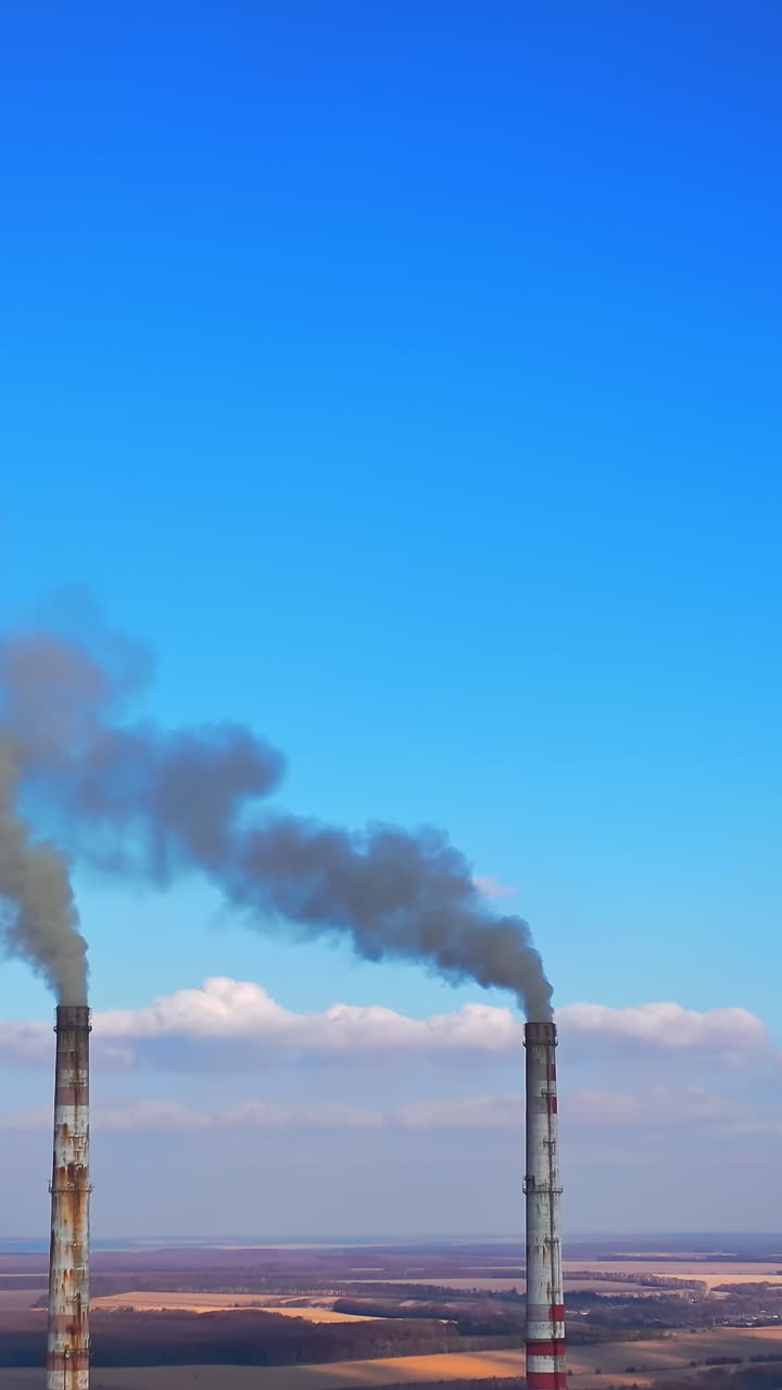 Environmental global warming atmosphere. Aerial view of factory polluted ecology.