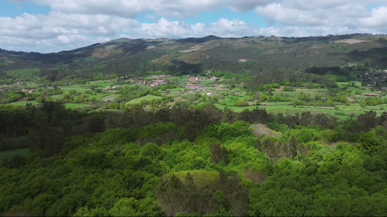 Dense Nature Landscape Overlooking Hamlet In Filgueira, Cerdedo-Cotobade, Pontevedra, Spain. Aerial Wide Shot