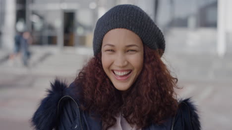 portrait beautiful young mixed race woman laughing enjoying successful urban lifestyle happy female student excited on college campus in city slow motion