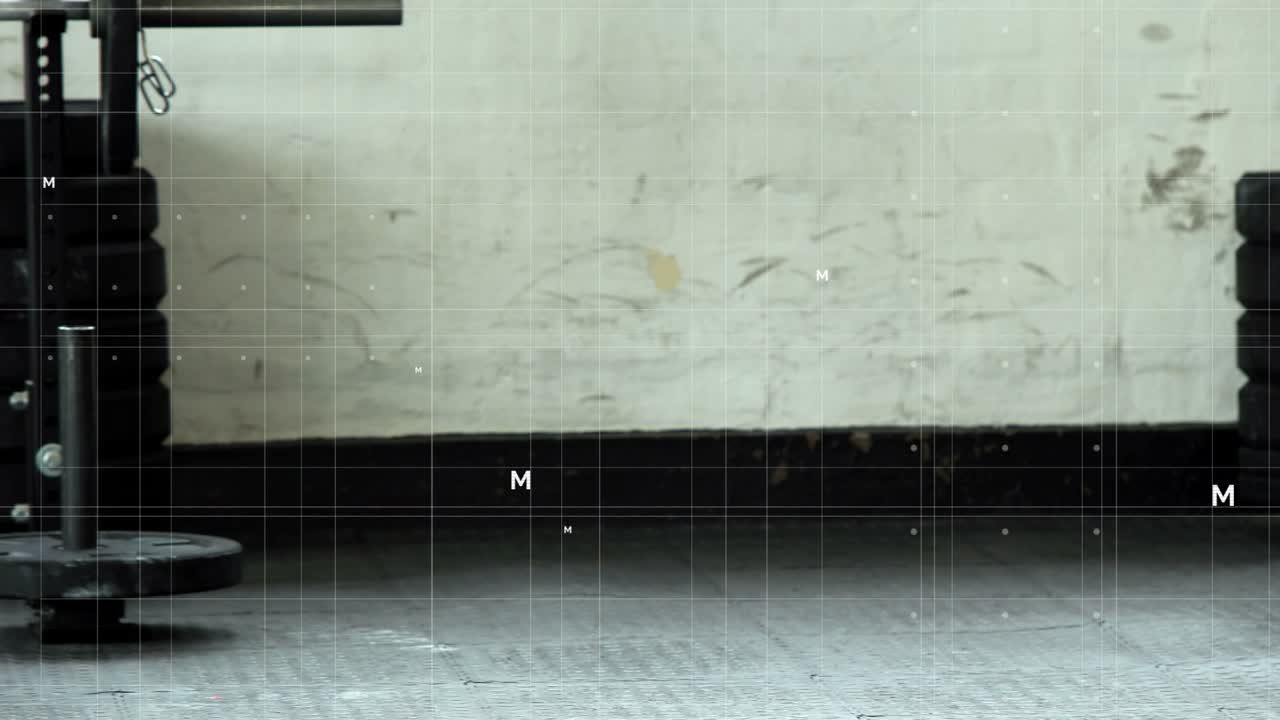 Man doing bicep curls in gym, dumbbell entering causing camera crop, grids circling arm for fitness