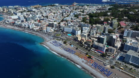 aerial tilt shot in front of downtown rhodes city, warm, sunny day in greece