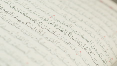 quran book close-up, praying, islamic religion. religious holiday ramadan, holy month. worship, making traditional prayer to god
