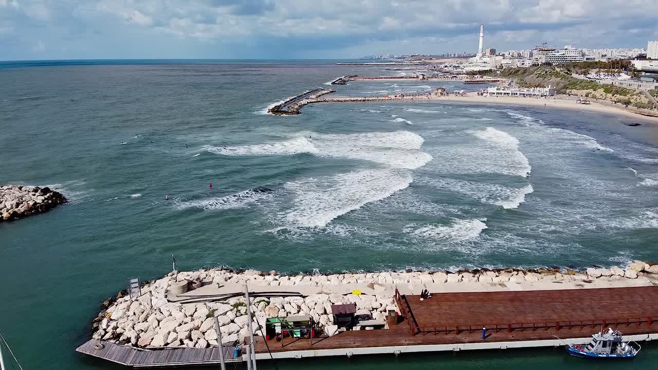 Aerial View of Marina and Coastline with Boats and Beach