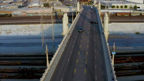 commuting concept - cars driving on 4th street bridge in los angeles city