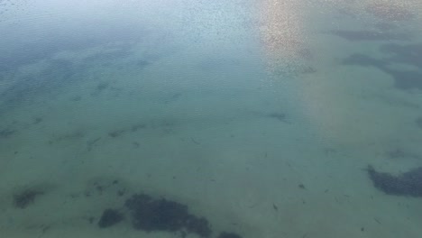 Low-Flying-Over-Clear-Blue-Sea-In-North-Wales