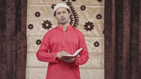 indian muslim teacher reciting poem to the students