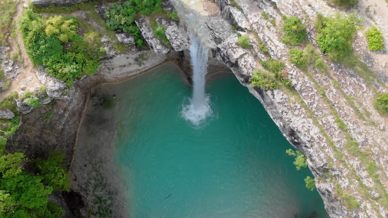 Aerial View of Stunning Turquoise Waterfall Pool